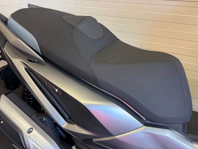 sym - adx-300