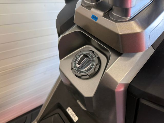 sym - adx-300
